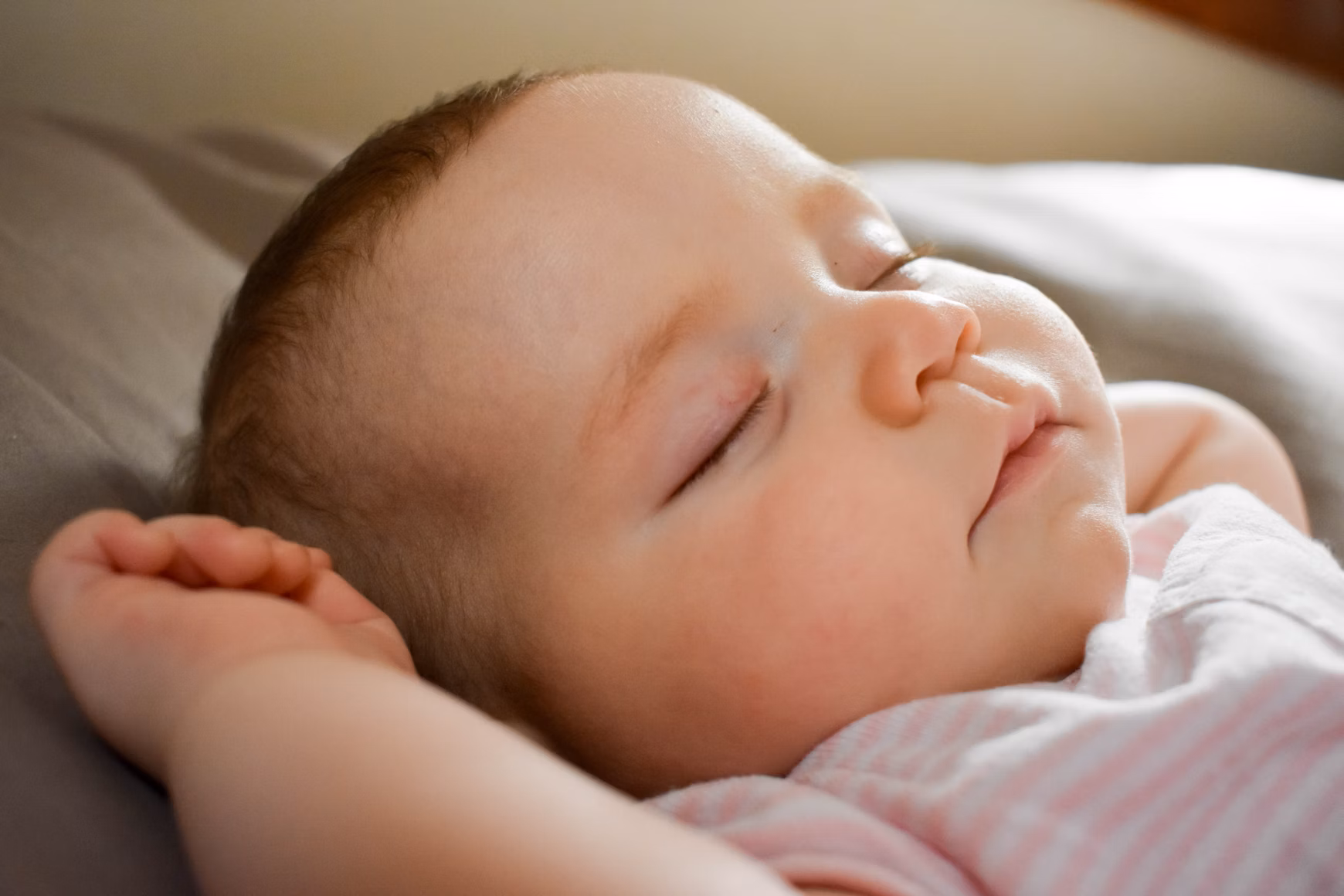 Peaceful sleeping child with teddy bear